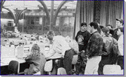 Photo of Kenn Pierson teaching a compuiter class at the University of Michigan.  Photo by Madeline Strong-Diehl.